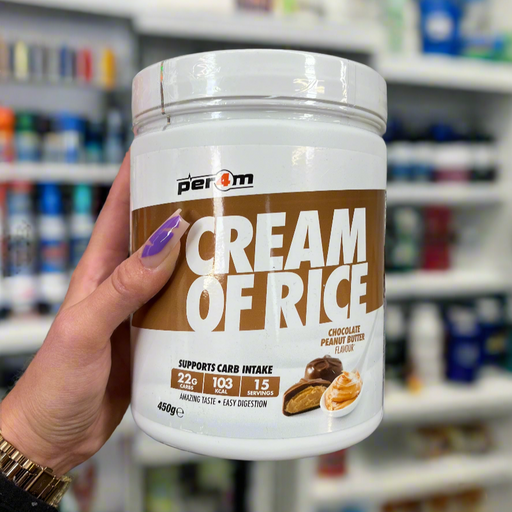 Close-up of (Per4m Cream of Rice 450g – Gluten-Free, Plant-Based Energy Snack) held up inside My Supplement Shop, clearly showing the front label in a Sports Nutrition setting.